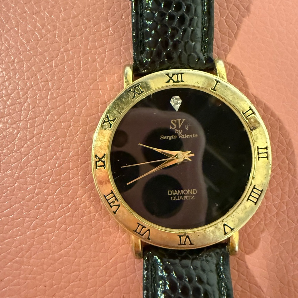 Sergio Valente Black and Gold Quartz Watch